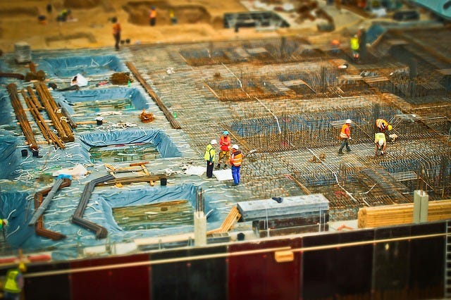Construction workers using tilt-shift
