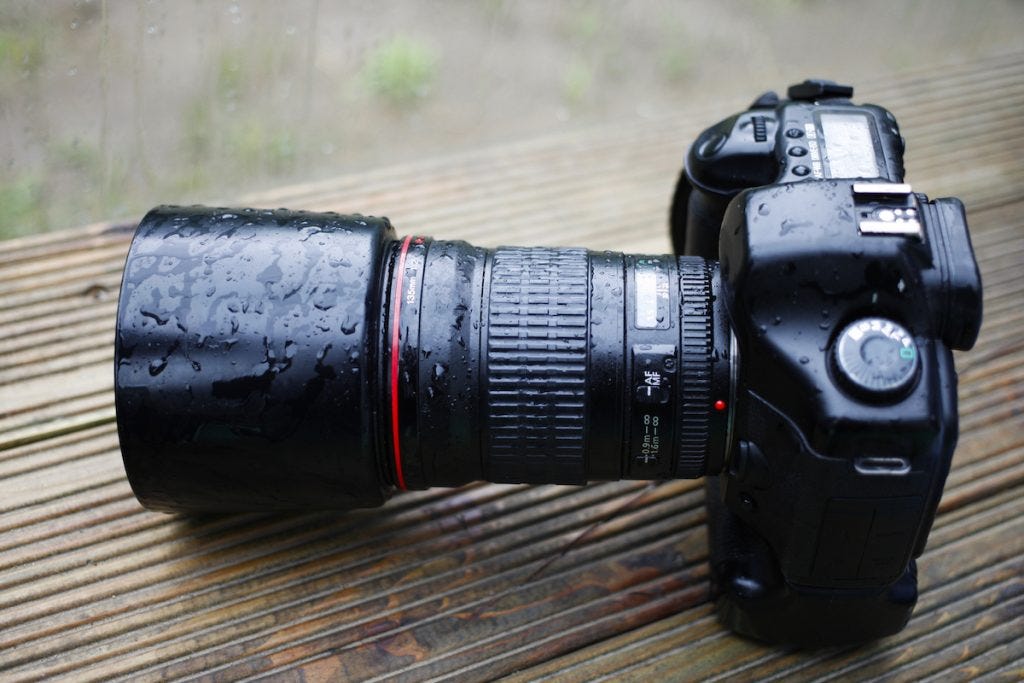 dslr-camera-left-outside-in-rain