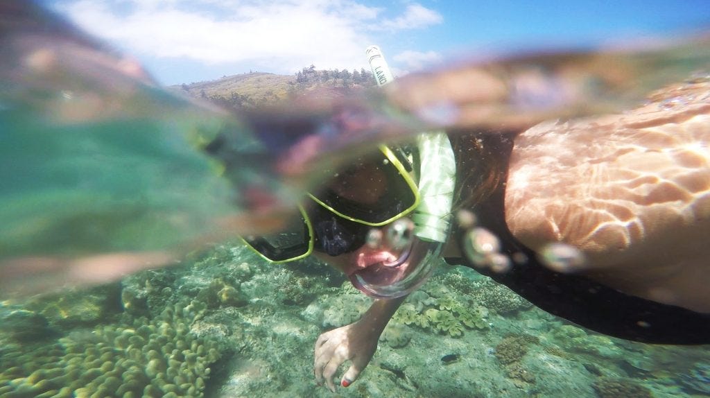 woman-takes-selfie-while-snorkelling