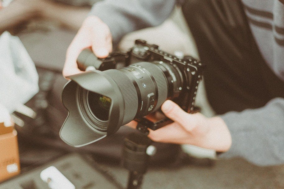 photographer setting up camera for time lapse