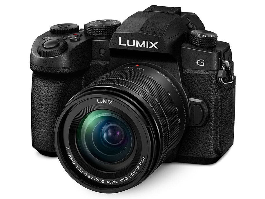 A Panasonic Lumix G95 camera with deep grip and lens.