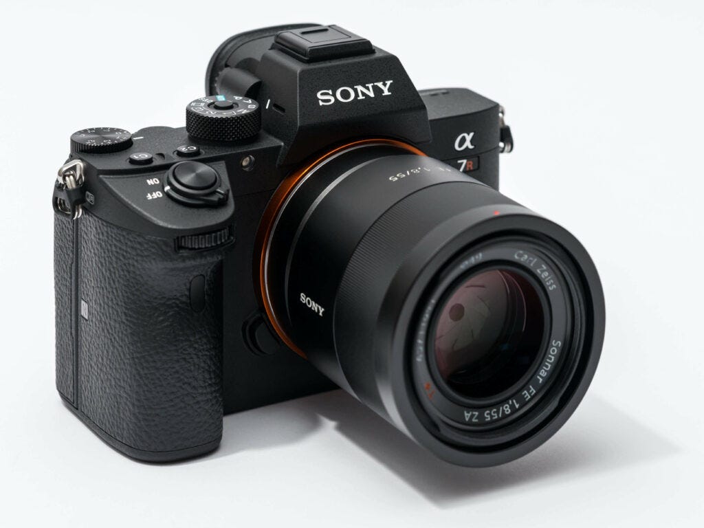 A front view of the Sony a7R Mark 3 mirrorless camera against a white background
